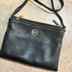 Black and gold Michael Koors tri fold wallet/cross body